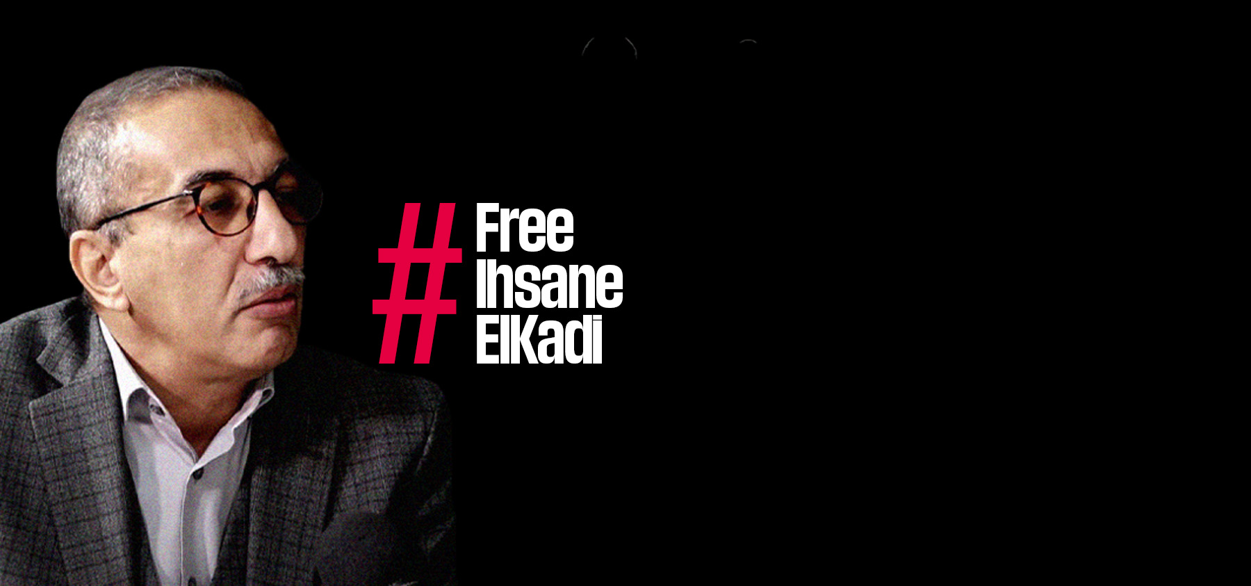 Ihsane el-Kadi vor schwarzem Hintergrund mit dem Hashtag "FreeIhsaneElKadi"