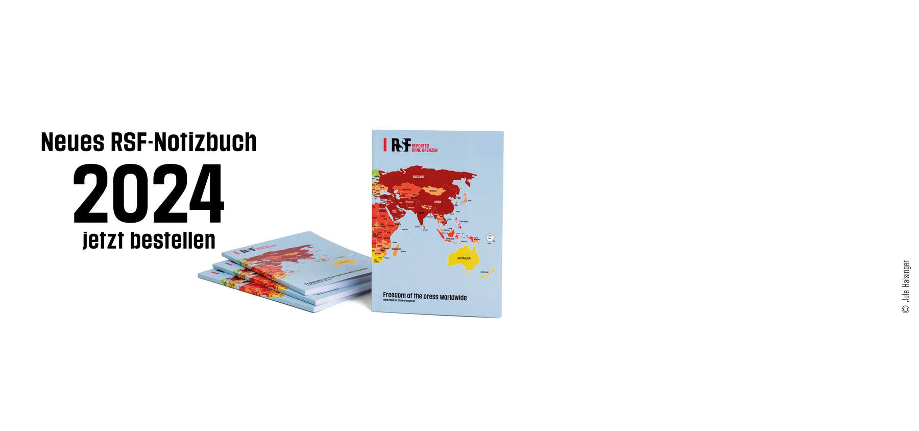 Notizbuch mit RSF-Weltkarte der Pressefreiheit