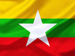 Gelb-grün-rote Flagge mit weißem Stern